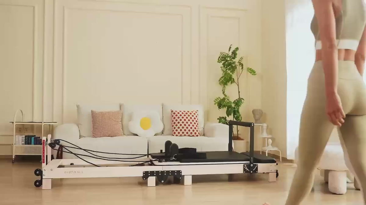 Load video: Formora Foldable Oak Wood Pilates Reformer